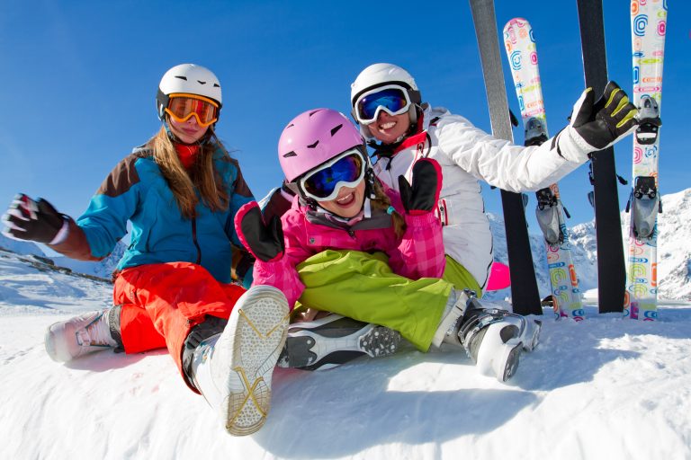Skiing,,Winter,,Snow,,Sun,And,Fun,-,Family,Enjoying,Winter