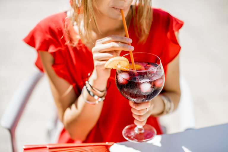 Woman,Holding,A,Glass,With,Sangria,,Traditional,Spanish,Alcohol,Beverage