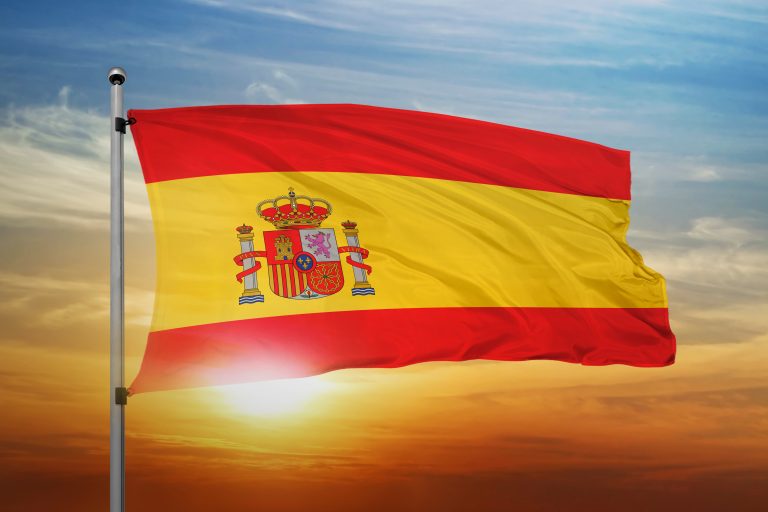 Spain,Flag,Waving,With,Cloudy,Blue,Sky.,Spain,Realistic,3d