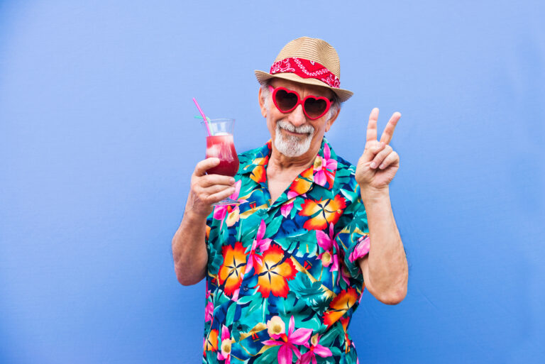 Funny,And,Extravagant,Senior,Man,Posing,On,Colored,Background,-