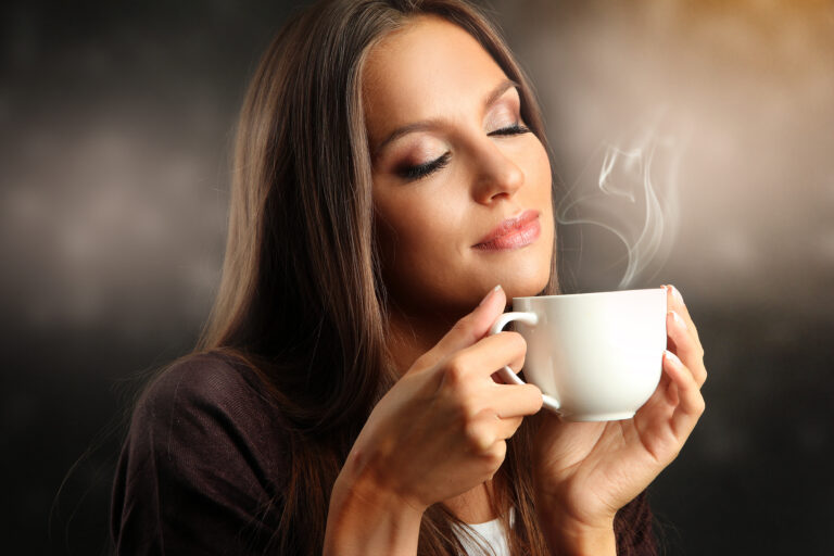 Beautiful,Young,Woman,With,Cup,Of,Coffee