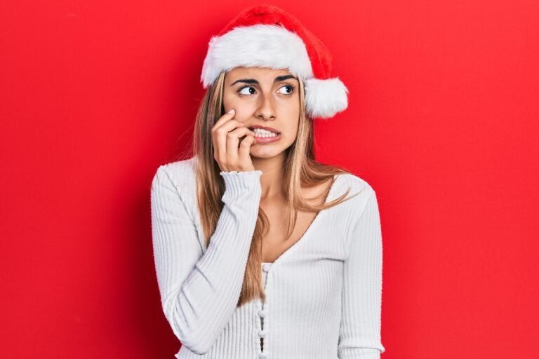 Beautiful,Hispanic,Woman,Wearing,Christmas,Hat,Looking,Stressed,And,Nervous