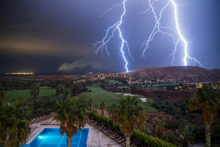 Lightnings,Over,A,Hotel's,Swimming,Pool,,Almería,,Andalusia,,Spain.