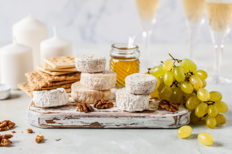 Christmas,Cheese,Platter,,Variety,Of,French,Cheeses,,Green,Grapes,,Walnuts,