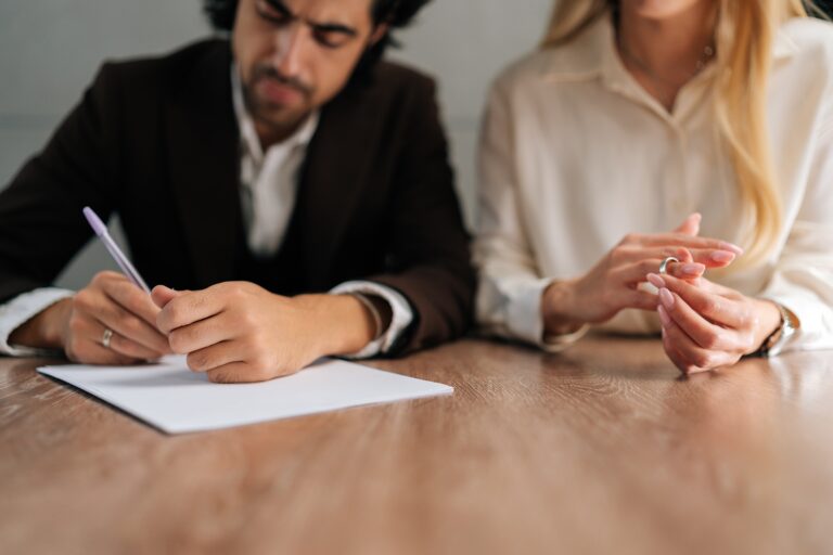 Cropped,Shot,Of,Spouses,Couple,Signing,Decree,Papers,Getting,Divorced